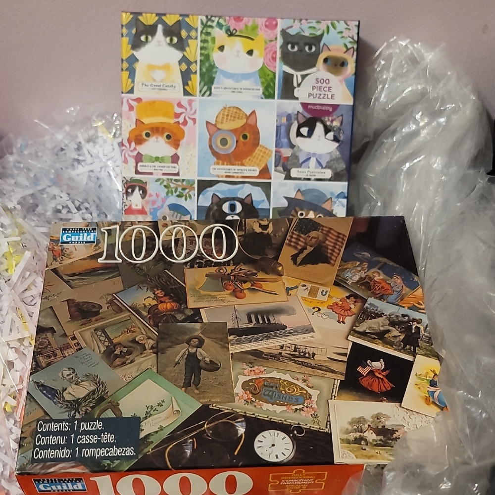 2 puzzles 1 sealed new.